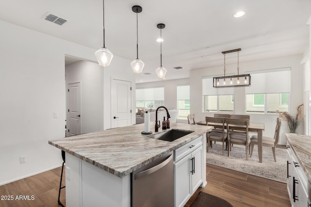 1250 N Abbey Ln Unit 206, Chandler, AZ 85226 - kitchen featuring stainless steel dishwasher, a sink, dark wood-style flooring, white cabinetry, and light stone countertops