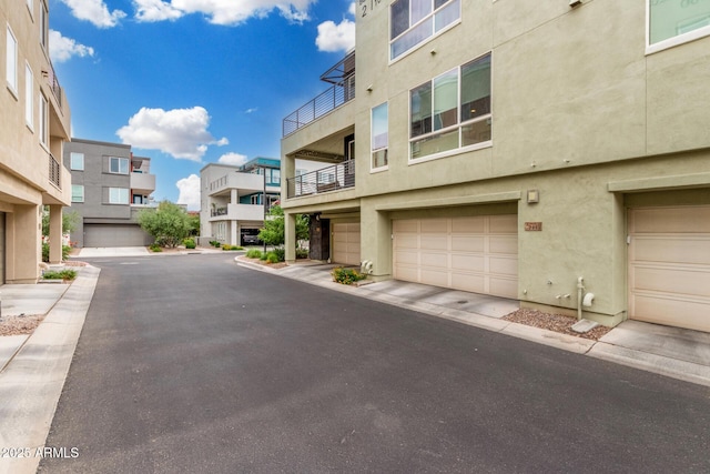 1250 N Abbey Ln Unit 206, Chandler, AZ 85226 - view of asphalt road featuring curbs