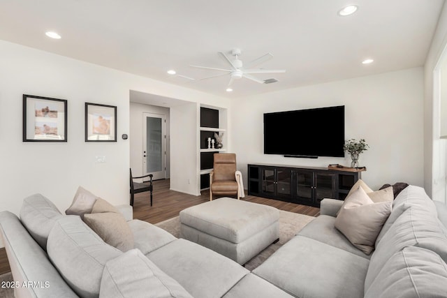 1250 N Abbey Ln Unit 206, Chandler, AZ 85226 - living area featuring recessed lighting, a ceiling fan, wood finished floors, built in features, and baseboards