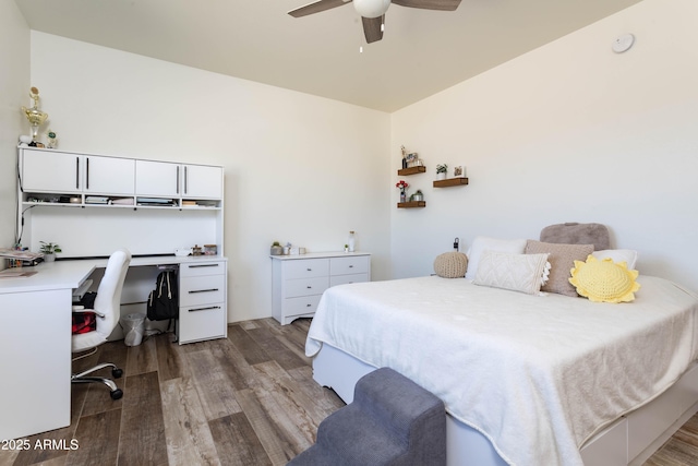 bedroom featuring wood-type flooring and ceiling fan