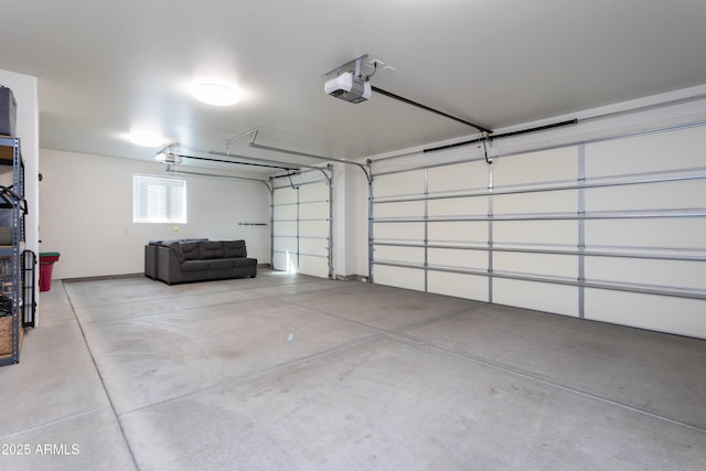 garage featuring a garage door opener