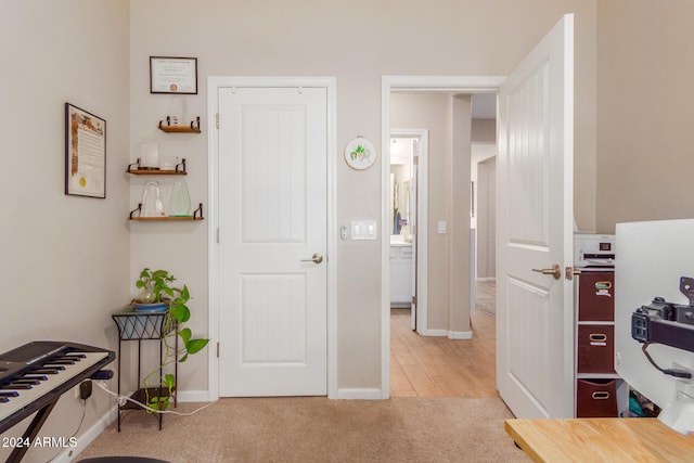 interior space featuring light colored carpet