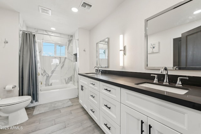 bathroom with toilet, shower / bath combination with curtain, double vanity, healthy amount of natural light, and recessed lighting