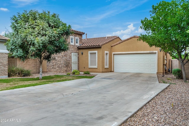 view of front of home with a garage