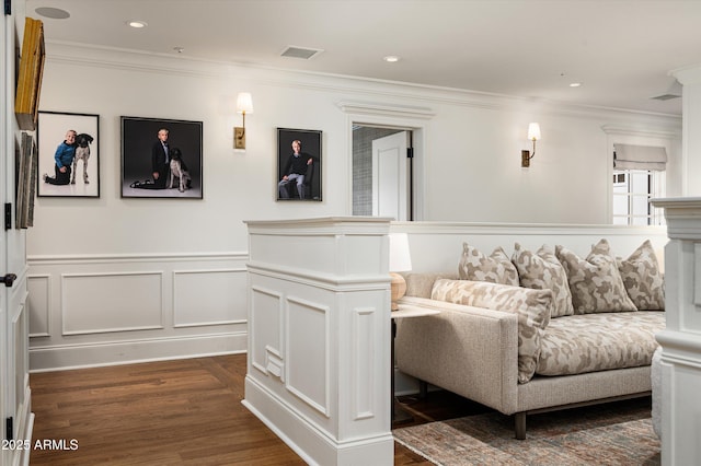 living room featuring dark wood finished floors, visible vents, crown molding, and recessed lighting