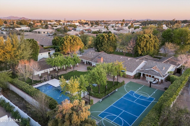 aerial view at dusk with a residential view