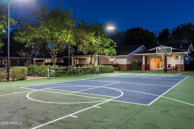 view of sport court with community basketball court and fence