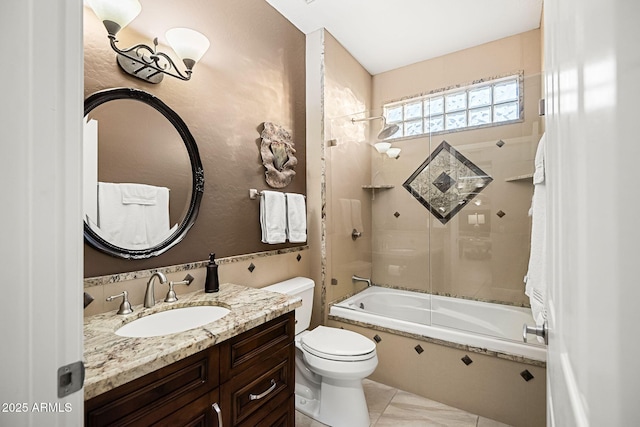 bathroom featuring vanity, toilet, and combined bath / shower with glass door