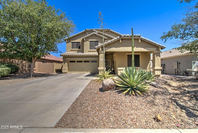 708 E Dry Creek Rd, San Tan Valley, AZ 85143 - view of front of house featuring stucco siding, concrete driveway, a garage, and a tile roof
