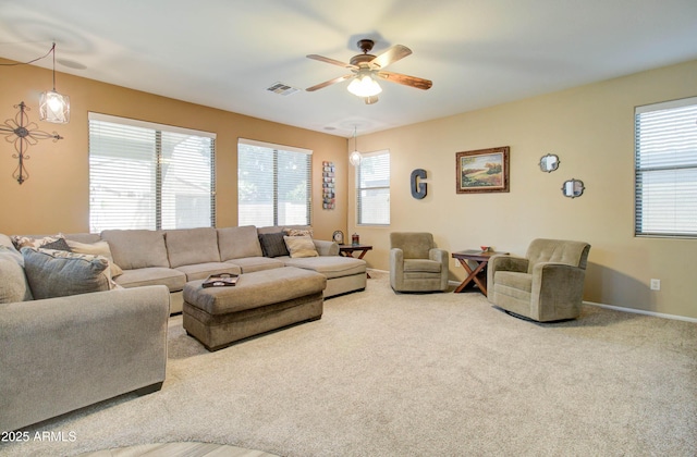 708 E Dry Creek Rd, San Tan Valley, AZ 85143 - carpeted living area featuring a ceiling fan and baseboards