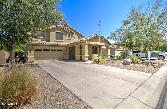 708 E Dry Creek Rd, San Tan Valley, AZ 85143 - mediterranean / spanish-style home with stucco siding, driveway, a tile roof, and a garage