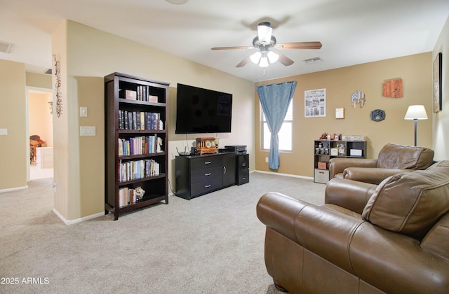 708 E Dry Creek Rd, San Tan Valley, AZ 85143 - living room featuring a ceiling fan and light colored carpet