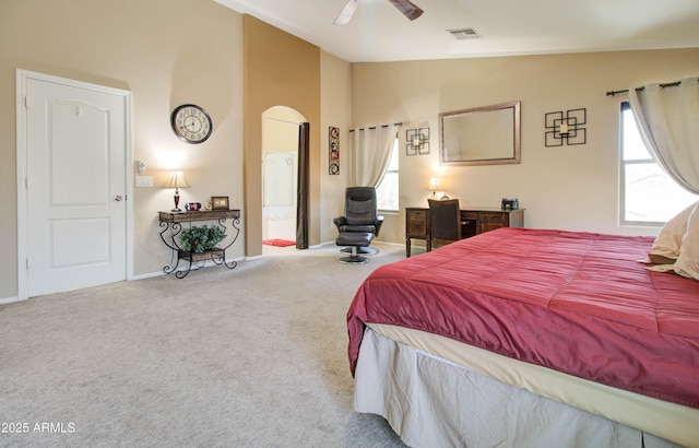 708 E Dry Creek Rd, San Tan Valley, AZ 85143 - bedroom featuring arched walkways, multiple windows, carpet flooring, high vaulted ceiling, and a ceiling fan