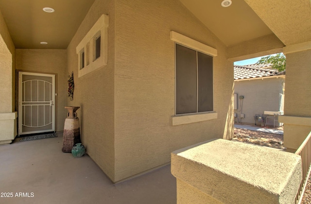 708 E Dry Creek Rd, San Tan Valley, AZ 85143 - doorway to property with stucco siding and a patio area