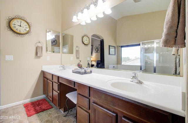 708 E Dry Creek Rd, San Tan Valley, AZ 85143 - full bath featuring double vanity, high vaulted ceiling, and a stall shower