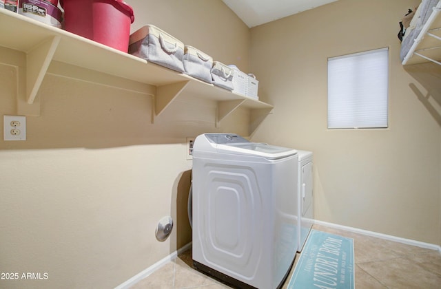 708 E Dry Creek Rd, San Tan Valley, AZ 85143 - laundry area with washing machine and clothes dryer and light tile patterned floors