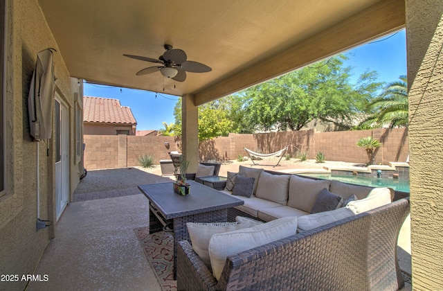 708 E Dry Creek Rd, San Tan Valley, AZ 85143 - fenced backyard featuring outdoor lounge area, a patio area, and a ceiling fan
