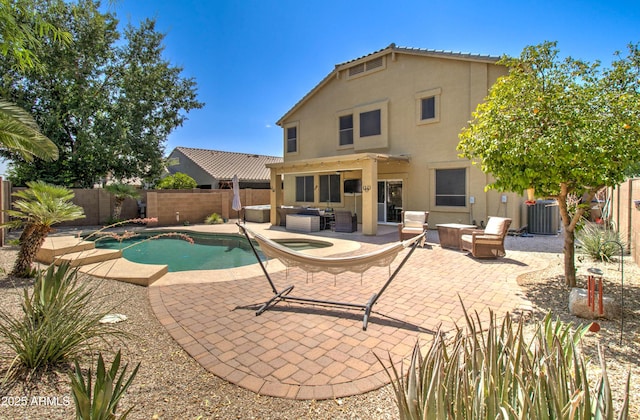 708 E Dry Creek Rd, San Tan Valley, AZ 85143 - view of swimming pool with a fenced backyard, a patio area, an outdoor hangout area, and an in-ground hot tub