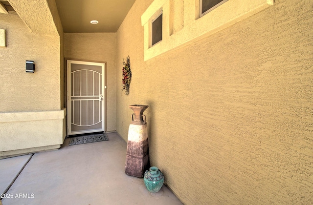 708 E Dry Creek Rd, San Tan Valley, AZ 85143 - view of exterior entry featuring stucco siding