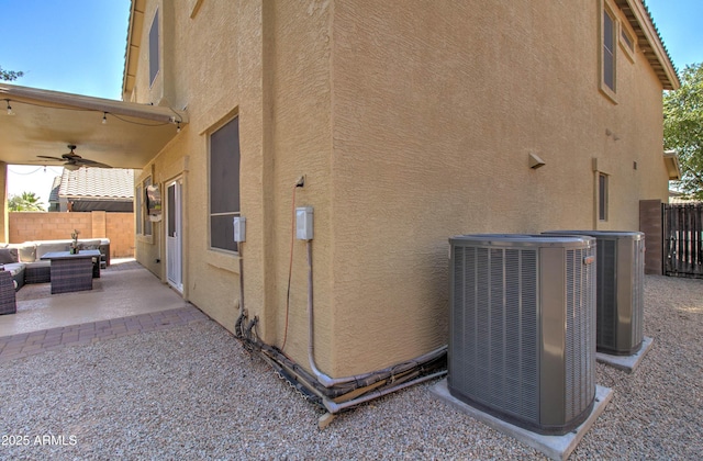 708 E Dry Creek Rd, San Tan Valley, AZ 85143 - view of side of property with stucco siding, a patio, and ceiling fan