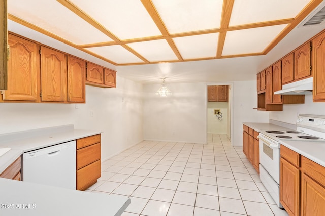 kitchen with white appliances, light tile patterned floors, visible vents, light countertops, and under cabinet range hood