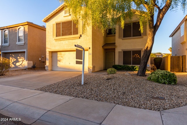 view of front of property with a garage