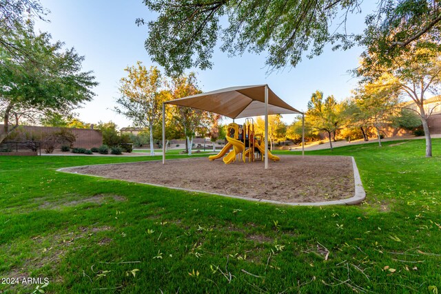 view of playground with a yard