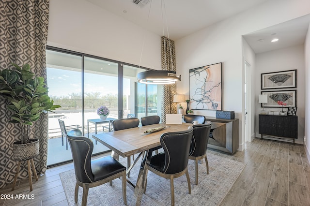 dining room featuring light hardwood / wood-style floors