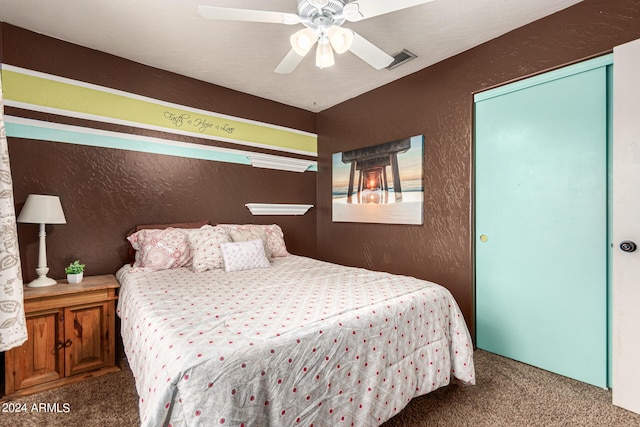 carpeted bedroom with ceiling fan