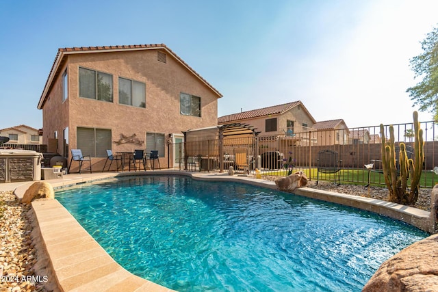 view of pool featuring a patio area