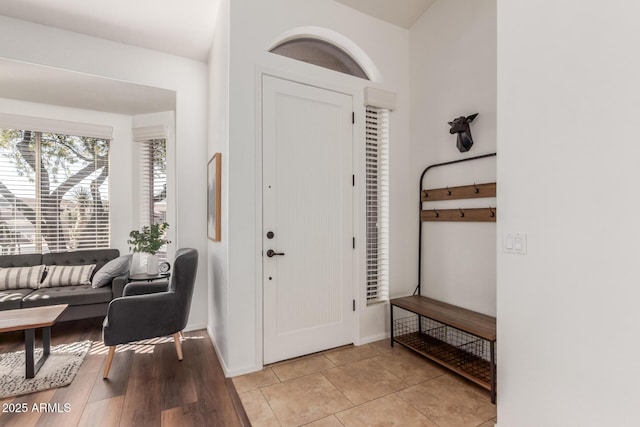 entryway featuring light tile patterned flooring