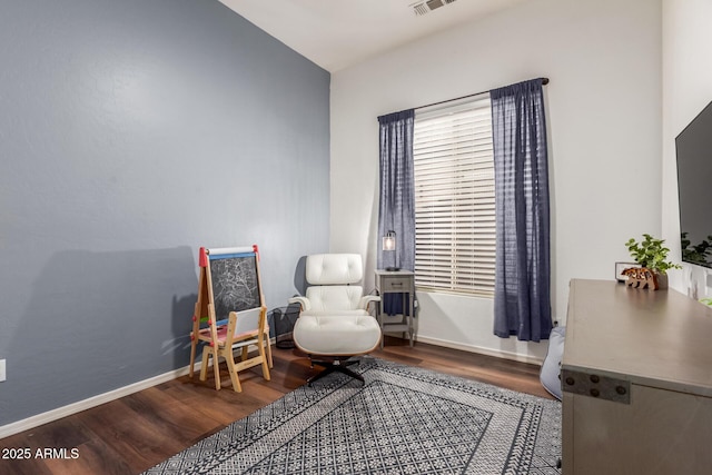 sitting room featuring hardwood / wood-style flooring