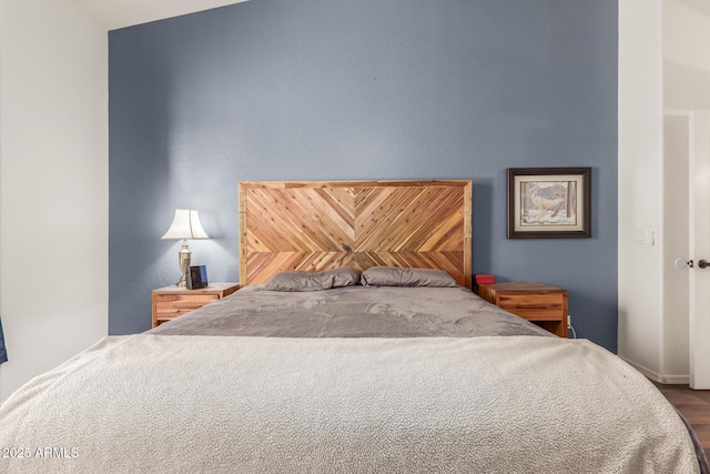 unfurnished bedroom with vaulted ceiling