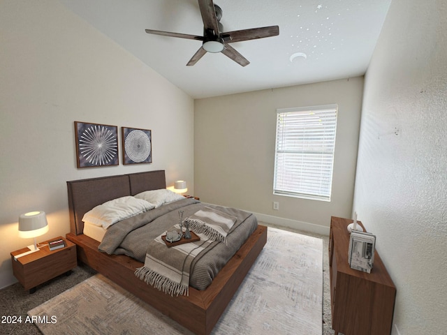 bedroom featuring vaulted ceiling and ceiling fan