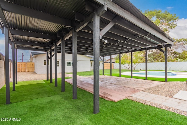 view of patio / terrace with a fenced in pool and a fenced backyard