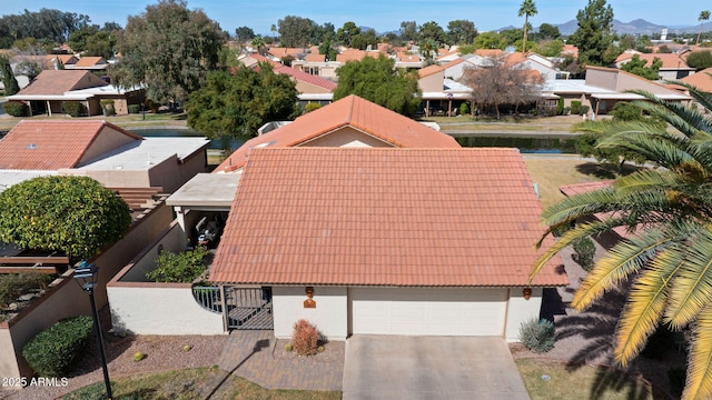 bird's eye view with a residential view and a mountain view