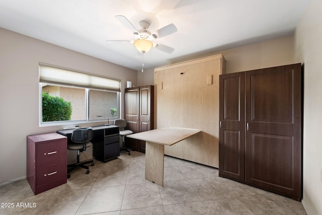 office area featuring a ceiling fan and light tile patterned floors