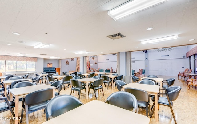 dining space with visible vents