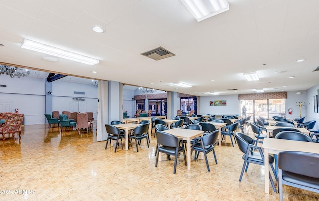 dining room with visible vents