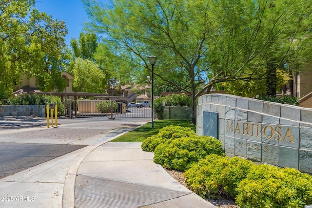 exterior space with a gate and fence