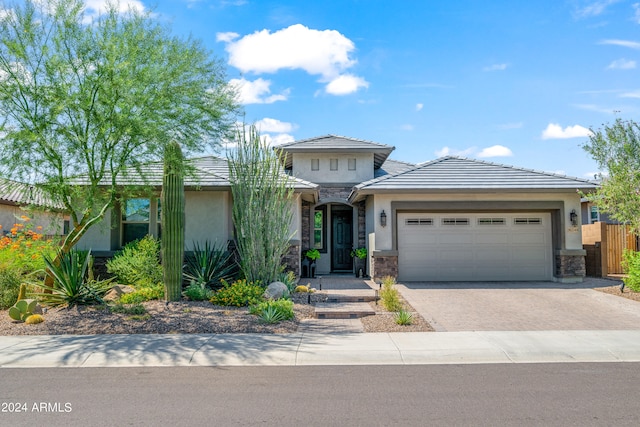 view of front of property featuring a garage