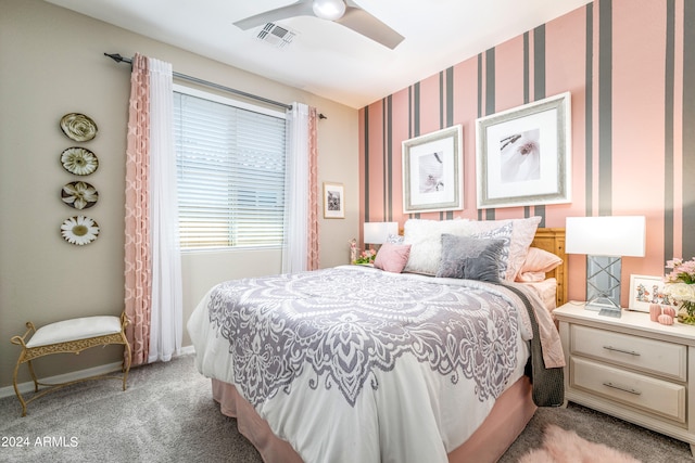 bedroom featuring ceiling fan and light colored carpet