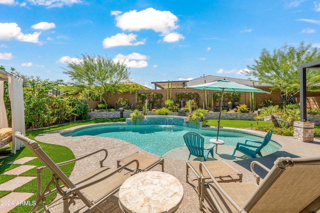 view of swimming pool featuring a patio