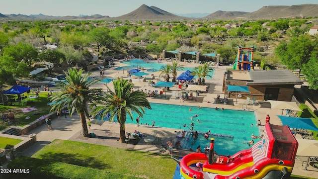 view of swimming pool featuring a mountain view