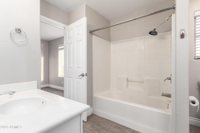 full bathroom with plenty of natural light, tub / shower combination, and vanity