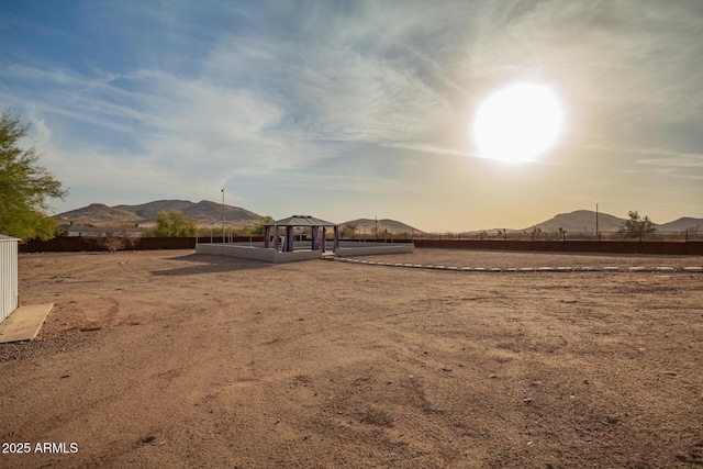 view of yard with a gazebo and a mountain view