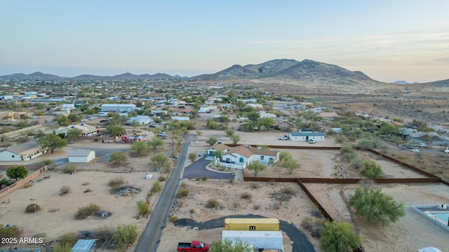 birds eye view of property with a residential view and a mountain view