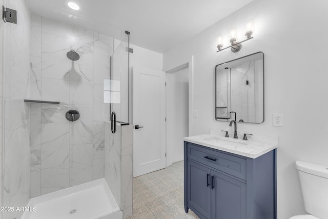 2425 E Harvard St, Phoenix, AZ 85008 - full bath featuring tile patterned floors, a marble finish shower, vanity, and toilet