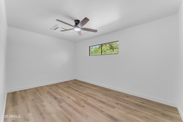 2425 E Harvard St, Phoenix, AZ 85008 - empty room featuring a ceiling fan, baseboards, and light wood-style flooring