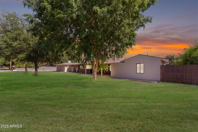 2425 E Harvard St, Phoenix, AZ 85008 - yard at dusk featuring fence